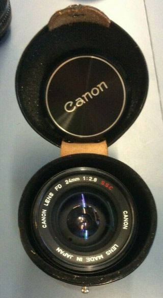 Canon Lens Fd 24mm 1:2.  8 S.  S.  C.  W/ Lens Case