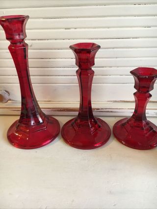 3 Vintage Ruby Red Glass Candlesticks 7.  5”,  6”,  4.  5”,  Small 3” Vase