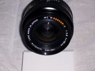 Minolta Mc W.  Rokkor - X 28mm 1:2.  8 Lens
