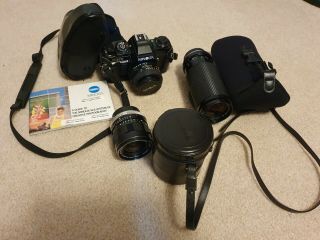 Minolta X570 Slr Camera W/3 Lenses,  6 Filters,  Leather Cases