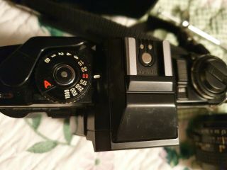 Minolta X570 SLR camera W/3 lenses,  6 filters,  leather cases 3