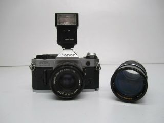 Vtg Canon Ae - 1 Program 35mm Film Slr Camera W/ 2 Lenses & Sears Flash