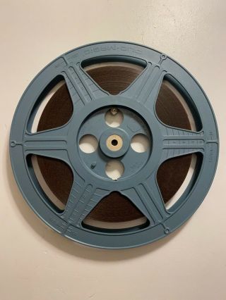 10.  5” Light Grayish Blue Plastic Film Reel 16mm With Film And Case