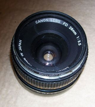 Canon Fd 28mm F3.  5 Lens With Nova 55mm Skylight Filter Lens,
