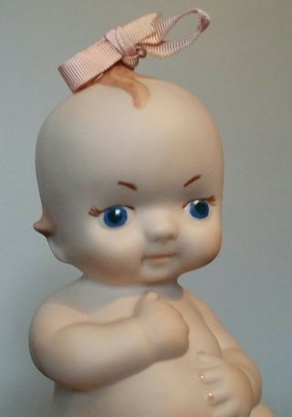 Bisque Porcelain Kewpie Doll with Blue Wings and Cloth Bow 5.  25 