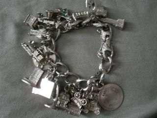 Vintage Monet Silvertone Charm Bracelet With 22 Charms,  6 Sterling Charms,  Dfa