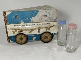 2 Vintage 1950’s Steadifeed 3” Glass Baby Doll Bottles,  Nos Bracelet/storybook