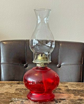 Vintage Red Eagle Glass Kerosene Oil Table Lamp With Clear Glass Globe.
