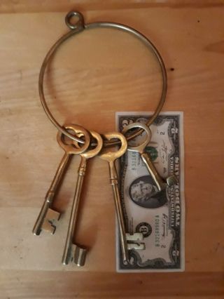 4 Vintage Large Brass Skeleton Keys On Round Ring Collectible Decor