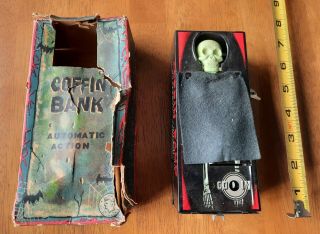 Vintage Yone Coffin Bank,  Automaic Action,  Wind Up Tin Toy And Box