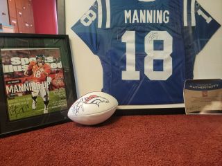 Peyton Manning Signed Memorabilia,  Photos And Game Items Including Frames