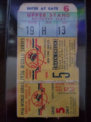 1956 World Series Game 5 Ticket With A Signed Ball By Pitcher Carl Erskine.
