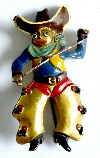 A Vintage 1930s Gold Tone Cowboy Brooch With Painted Enamel