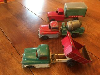 3 Vintage Toy Trucks (hubley Dump Truck & Cement Mixer & Unknown Fish Hatchery)