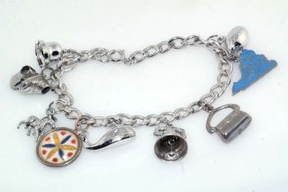 Vtg Sterling Silver Nine Charm Bracelet Enamel State Horse Whale Baby Shoe Bell