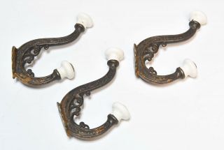 3 Vintage Matching Victorian Style Hat Or Coat Hooks With Porcelain Tips