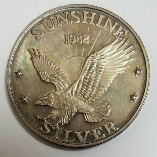 1982 Vintage - One Ounce - Sunshine Silver Mining Round Coin.  999 Uncirculated