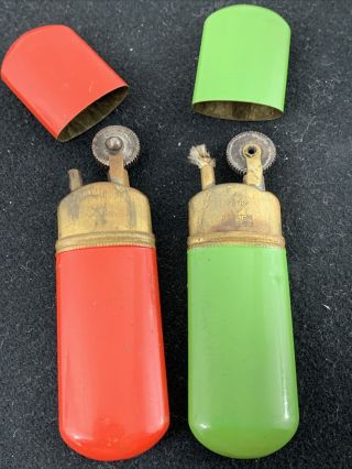 2 Vintage Brass Meb Pocket Lighters - Green & Red Made In Germany - Us Pat.  1912