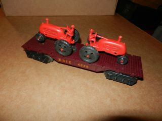 Marx 4528 Erie Flat Car With 2 Red Tractors,  1950 