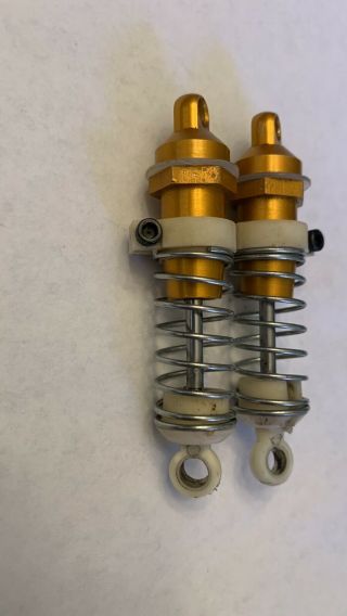 Vintage Rc10 Team Associated Gold Pan Classic Front Shocks.