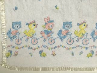 Vintage White Baby Blanket W Satin Trim Pastel Bunnies Cats And Ducks On Bikes