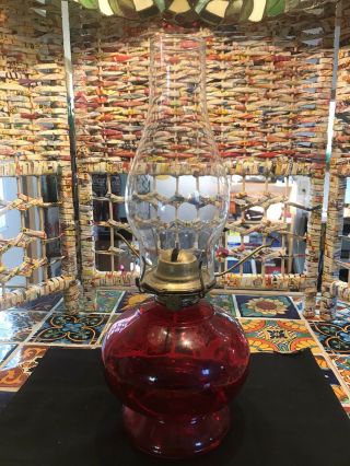 Vintage Red Glass Eagle Kerosene Table Lamp With Clear Glass Globe.