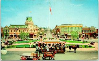 Vintage Disneyland California Postcard " A Busy Day At Town Square " 1957 Cancel