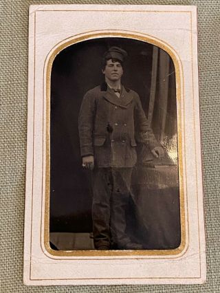Antique Tintype Photo Of A Man In Uniform With Hat Tinted Cheeks (servant ??)