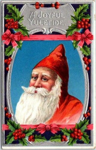 Vintage 1910s Christmas Embossed Postcard Santa Claus In Pointy Red Hood / Holly