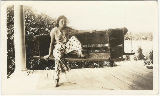 Young Woman In Wild Pants On Wicker Porch Swing 1930s Vintage Snapshot