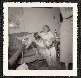 Vintage Antique Photograph Woman In Grass Skirt Laying On Couch Smoking Cigar