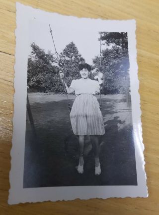 Vintage 1930s Snapshot Photo Of A Very Pretty Young Woman Posing On A Park Swing