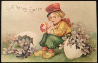 Vintage Clapsaddle Easter Postcard,  Dutch Boy With Large Eggs,  Flowers