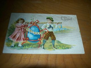 Vintage Antique Postcard Easter Victorian Boy & Girl Carrying A Large Egg