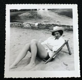 Vtg 1950s Snapshot Photo Leggy Woman In Low Beach Chair Cowboy Hat Bets He Can 