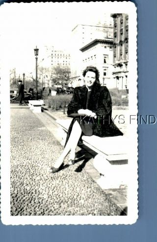 Found B&w Photo G,  3340 Pretty Woman In Coat Sitting On Bench With Legs Crossed