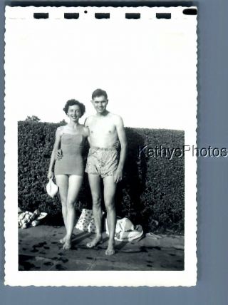 Found B&w Photo F,  6941 Man And Pretty Woman In Swimsuits Posed By Bushes