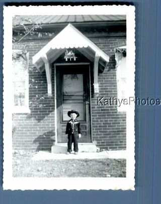 Black & White Photo J_8688 Little Cowboy Posed Outside House