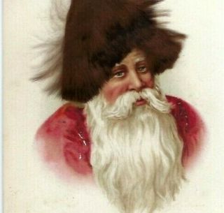 C 1910 Red Coat Santa St Nick Real Brown Fur Hat Large Face Postcard