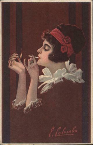 1920 E.  Colombo Fade - Away: Woman Dressed In Red,  Lighting A Cigarette.  Postcard