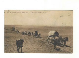 C.  1910 South Dakota Sioux Indians On Their Way To Cheyenne Agency Wagons,  Horses