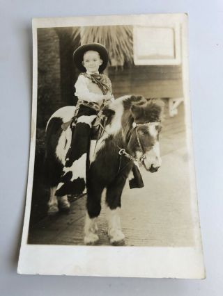 Photo Postcard—cute Little Boy Dressed As Cowboy On Shetland Pony 1920’s Card