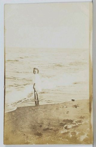 Rppc Young Girl Wading In Water At Beach Glancing Back A Smile Postcard K13