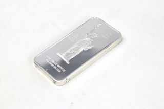 A Vintage One Troy Ounce Fine Silver Millennium Group With Certificate Ingot