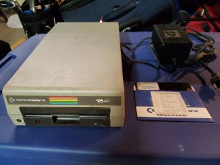 Commodore 1541 Floppy Disk Drive With Floppy Disk,  Guides,  And Power Cable