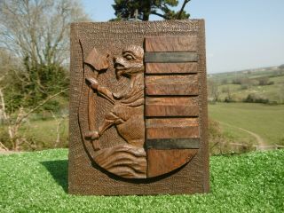 Antique 19thc Heraldic Gothic Oak Carved Panel Crest With Creature Holding Axe