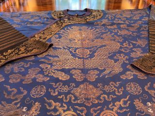 An Chinese Qing Dynasty Embroidered Textile Dragon Robe.
