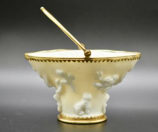 A Kangxi Period Chinese Blanc De Chine Porcelain Libation Cup With Ormolu Mounts