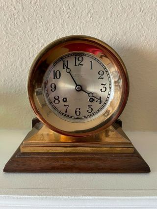 Chelsea Ships Bell Clock With Wood Stand.  About 1930