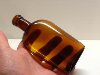 Antique 1/2 Pint Strap Side Whiskey Flask.